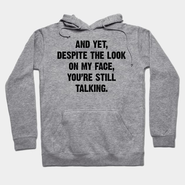 And Yet, Despite The Look On My Face, You're Still Talking. v2 Hoodie by Emma